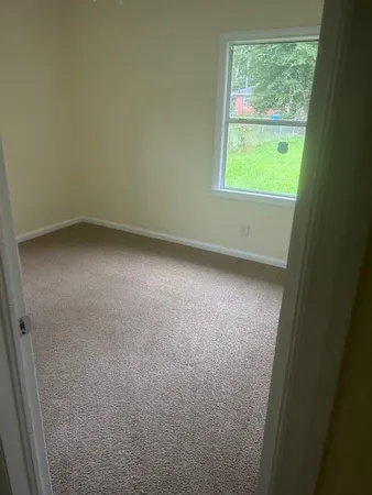 a view of a small space with a window