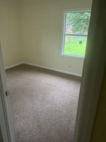 a view of a small space with a window