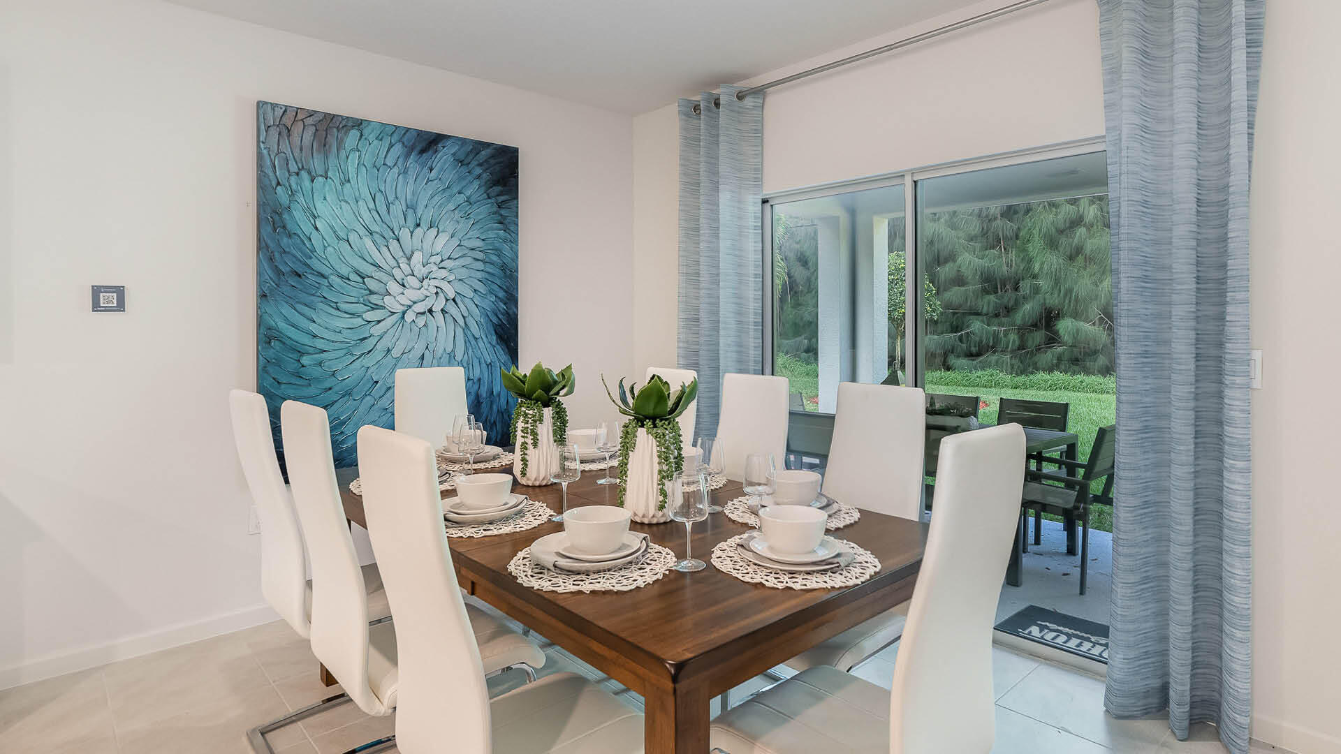 716 Northeast 15th Avenue Okeechobee, FL 34972 - Photo 6 of 26 a dining room with furniture and wooden floor