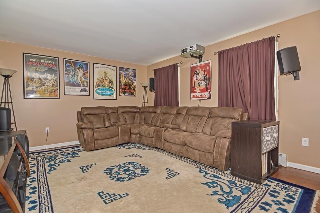 173 Webster Street Douglas, MA 01516 - Photo 14 of 42 a living room with furniture and window