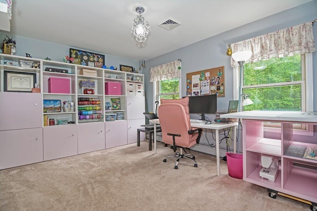 173 Webster Street Douglas, MA 01516 - Photo 28 of 42 a view of a workspace with furniture and a window