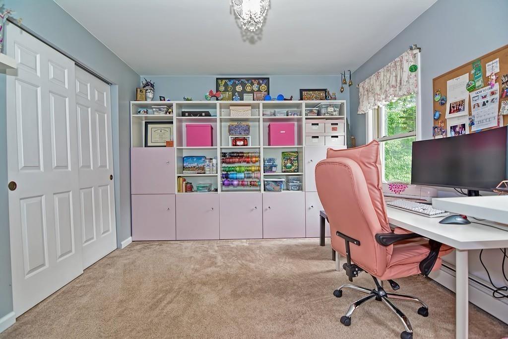 173 Webster Street Douglas, MA 01516 - Photo 30 of 42 a view of a workspace with furniture and a window