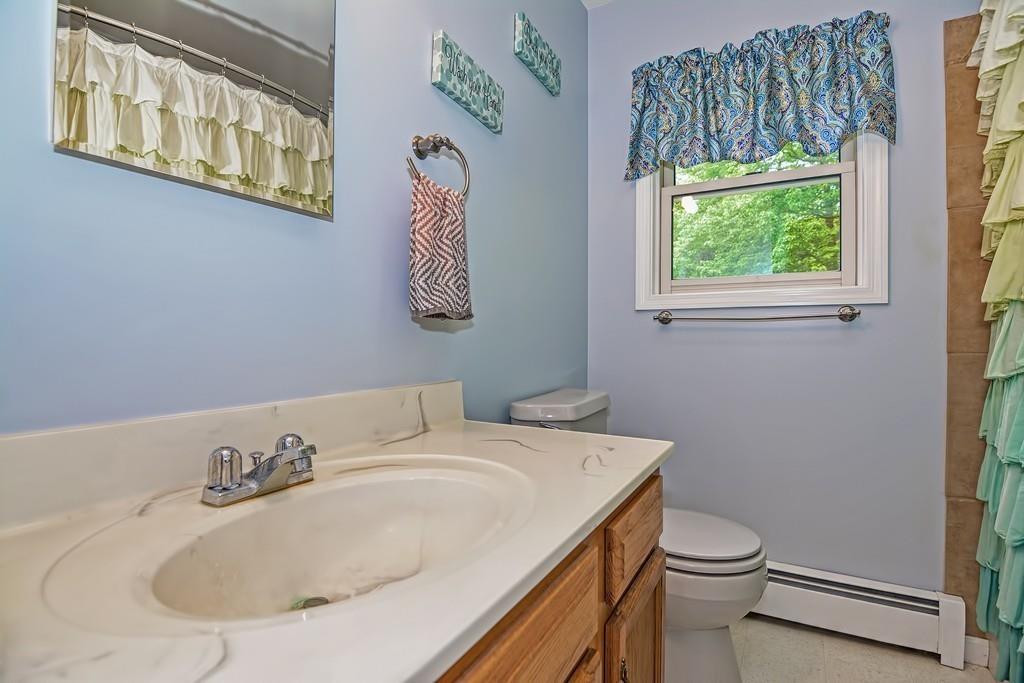 173 Webster Street Douglas, MA 01516 - Photo 34 of 42 a bathroom with a sink and a toilet