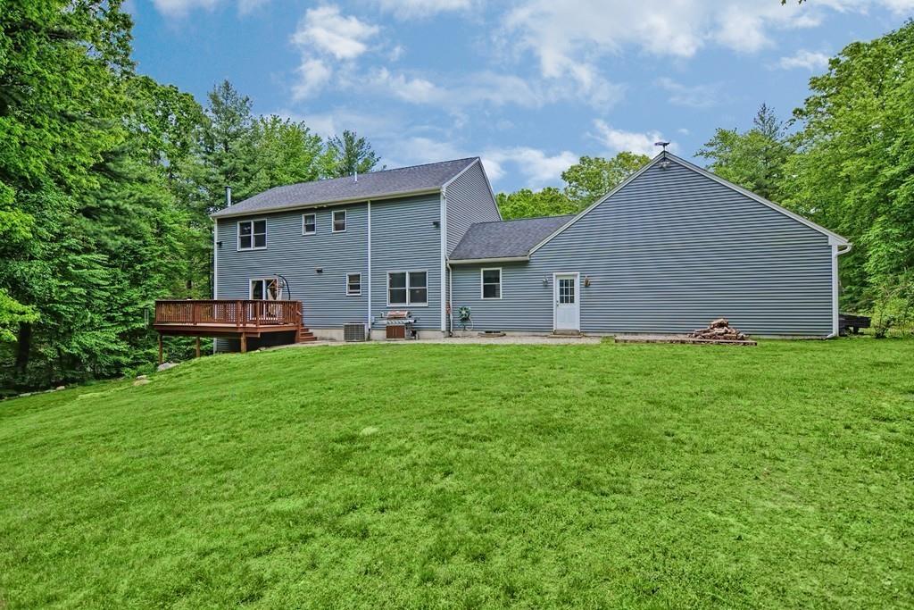 173 Webster Street Douglas, MA 01516 - Photo 41 of 42 a view of a house with backyard and garden