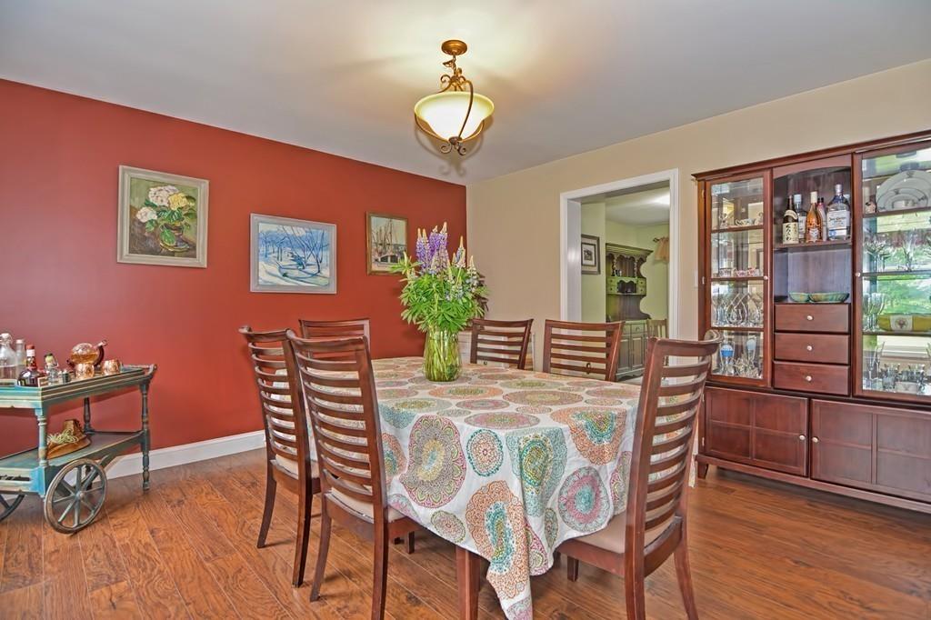 173 Webster Street Douglas, MA 01516 - Photo 7 of 42 a dining room with furniture a window and wooden floor
