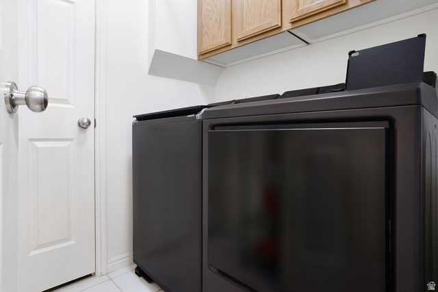 464 West Saddle Back Drive Springville, UT 84663 - Photo 14 of 15 Laundry area featuring white paneled doors, brushed nickel hardware, and wood-finish upper cabinetry
