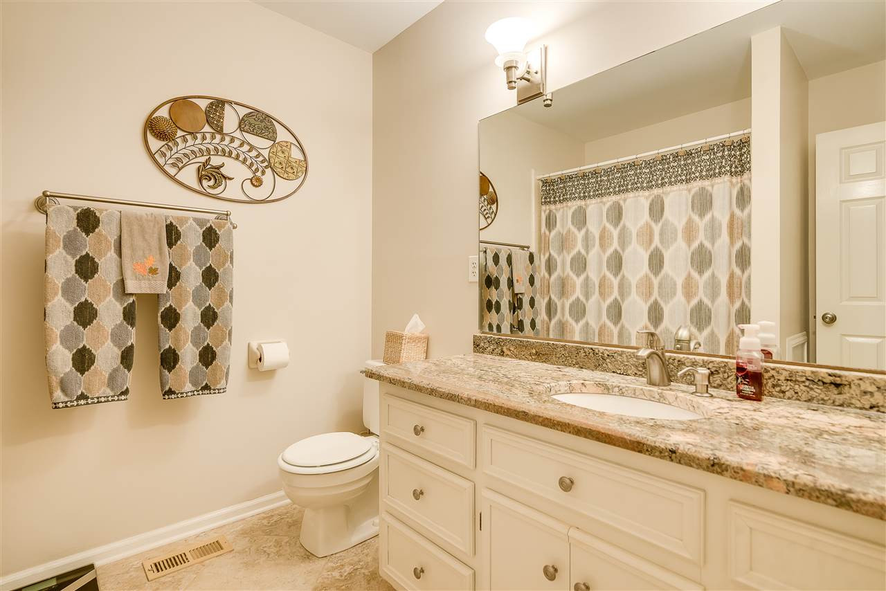 5 Chippers Way Durham, NC 27705 - Photo 14 of 25 Tub/Shower combination, Tile floors, granite counter Hall Bathroom