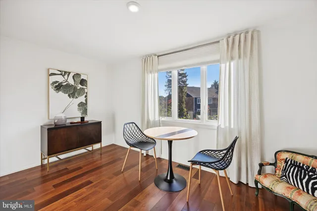 a room with furniture and a window