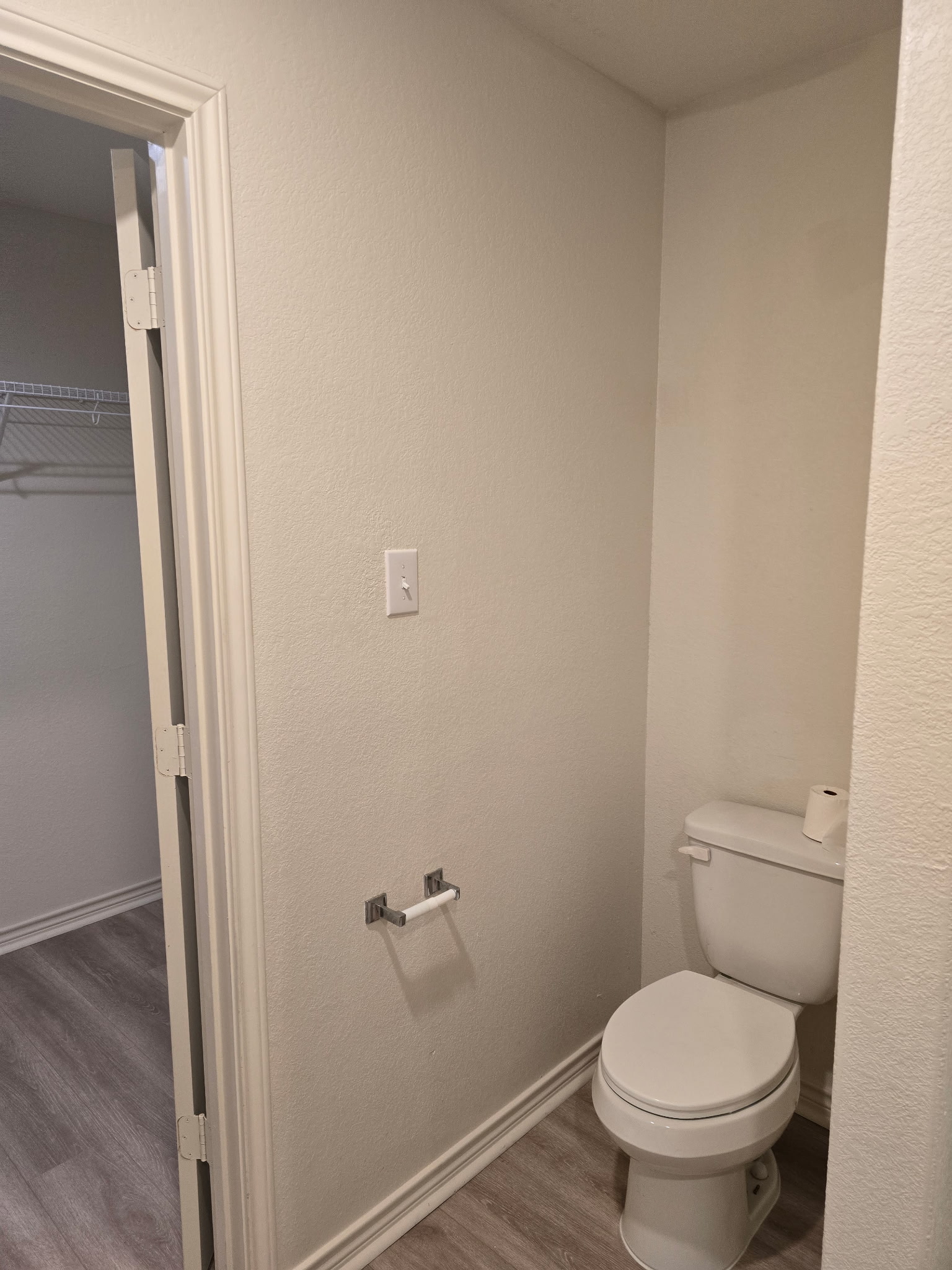 14421 Prairie Sod Lane Elgin, TX 78621 - Photo 8 of 10 Functional full bathroom with durable flooring and direct access to a closet.