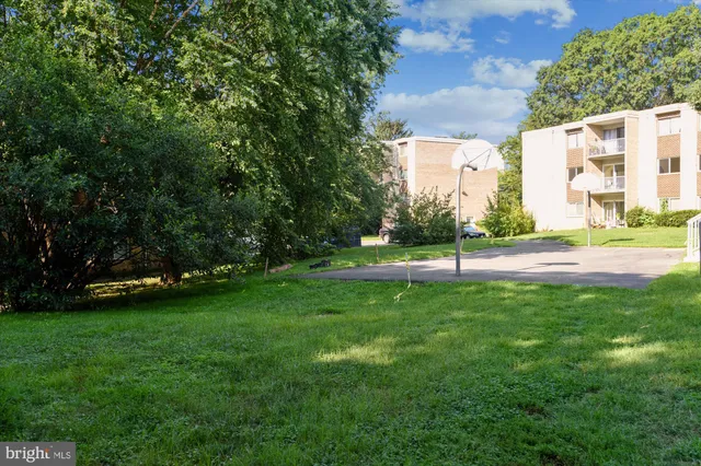 a front view of a building with garden