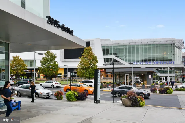 a view of a building with sitting area