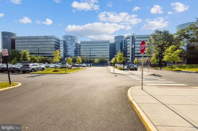 a view of a building with sitting area