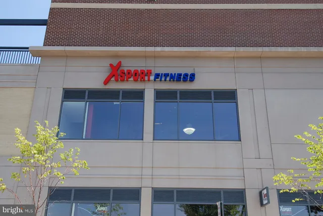 a front view of a building with garden