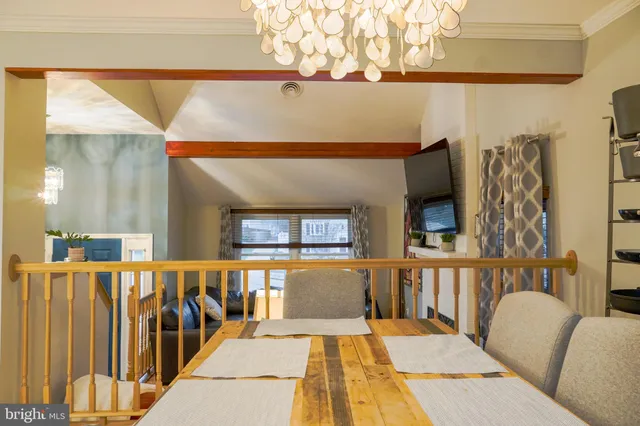 a living room with furniture with wooden floor