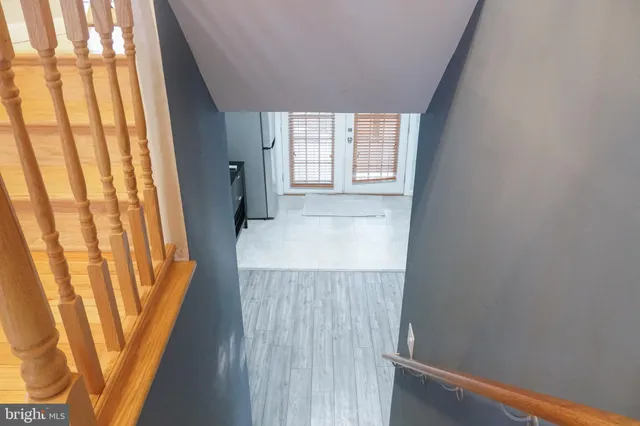 a view of a bathroom with a sink and a window
