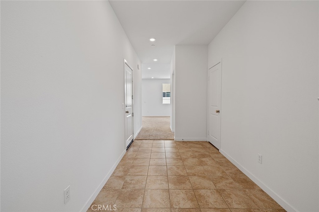 1942 North Florish Drive Compton, CA 90222 - Photo 7 of 47 a view of a hallway with wooden floor and a window