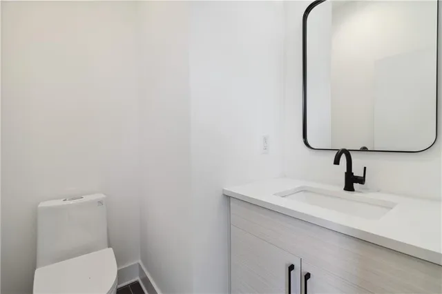 a view of a hallway with staircase