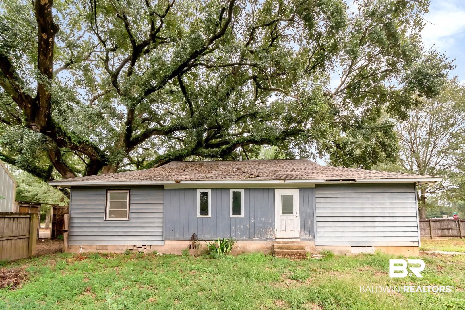 2762 Hillcrest Road Mobile, AL 36695 - Photo 22 of 25 Back of property with a yard