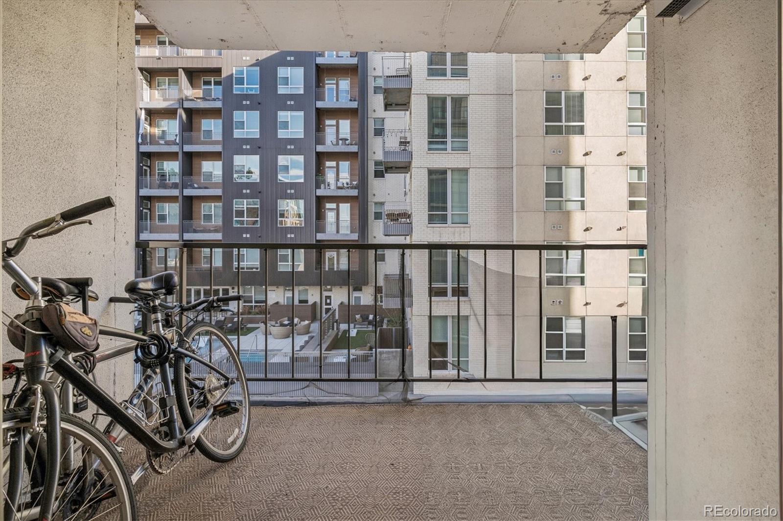 2 Adams Street, Unit 510 Denver, CO 80206 - Photo 16 of 37 a view of a room with racks on the wall