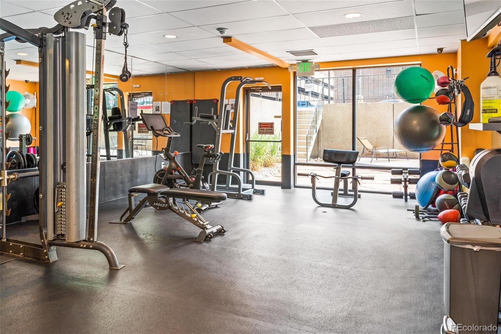 2 Adams Street, Unit 510 Denver, CO 80206 - Photo 33 of 37 a view of a room with gym equipment