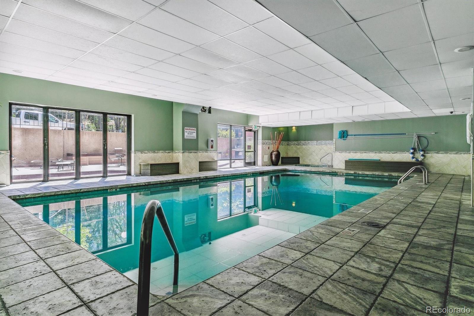 2 Adams Street, Unit 510 Denver, CO 80206 - Photo 37 of 37 a view of a swimming pool and outdoor seating