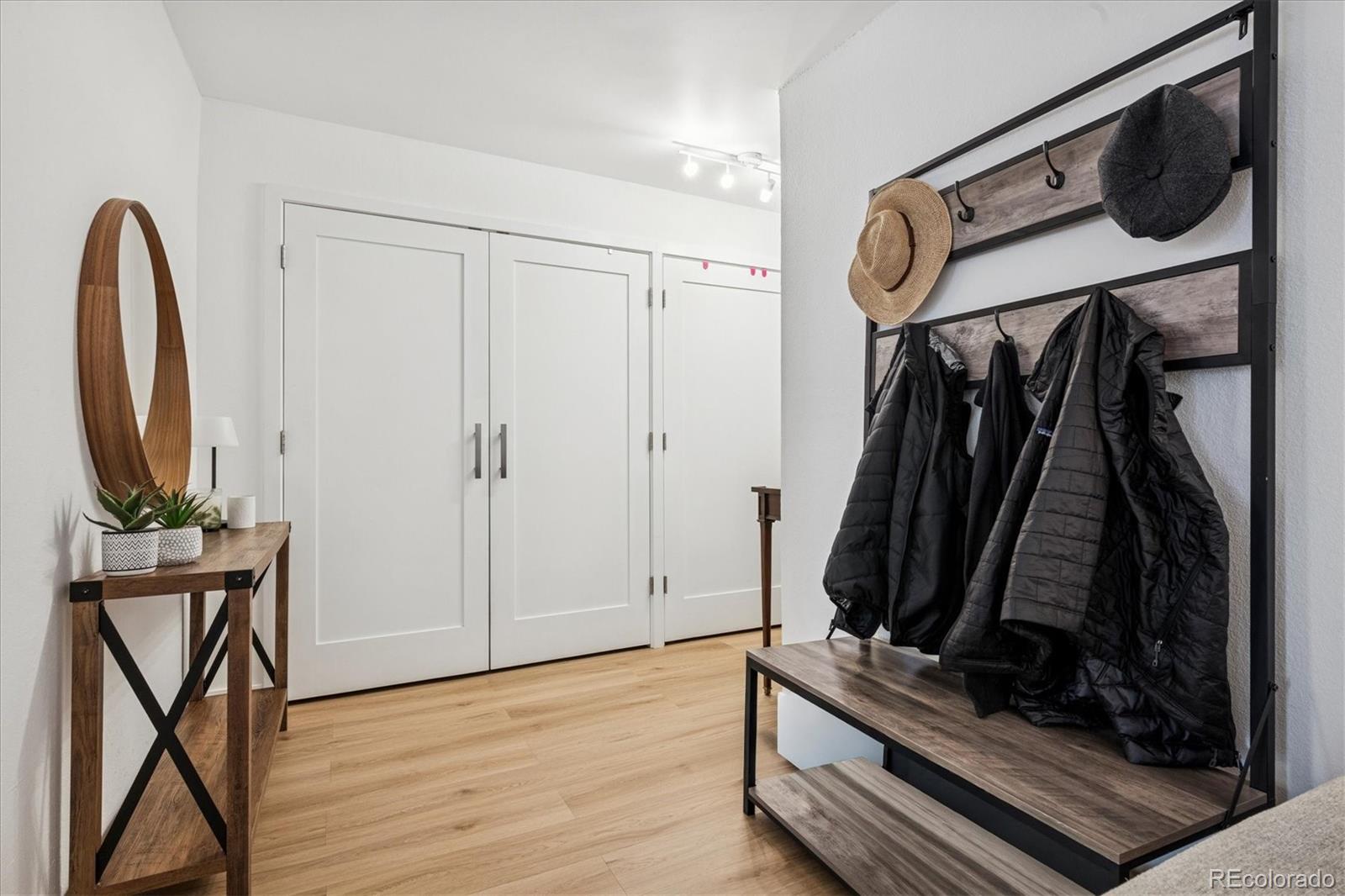 2 Adams Street, Unit 510 Denver, CO 80206 - Photo 5 of 37 a view of a walk in closet