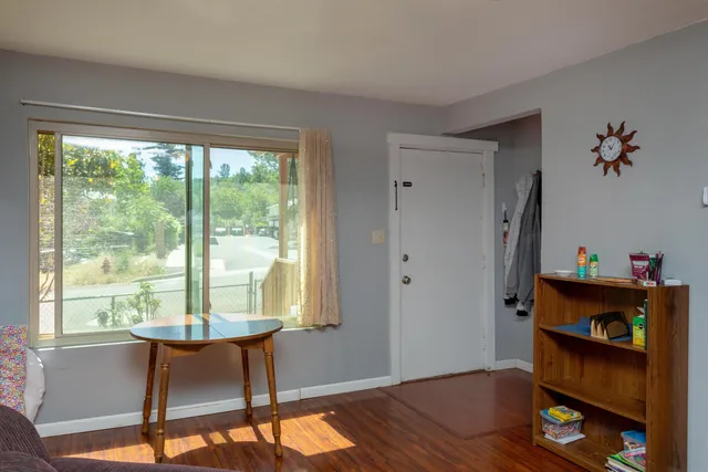 a workspace with furniture and a window