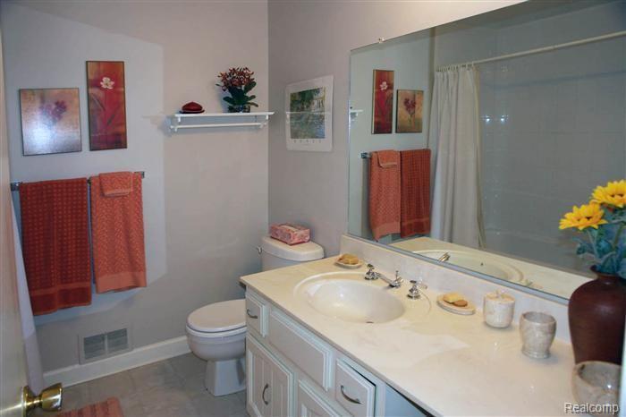 11703 Sycamore Road, Unit 4 Plymouth, MI 48170 - Photo 12 of 14 masterbathroom_700