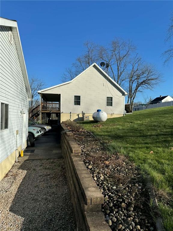 a view of a back yard of the house