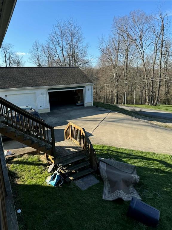 30 Summit Street Clarksville, PA 15322 - Photo 14 of 20 a view of swimming pool with seating space and garden