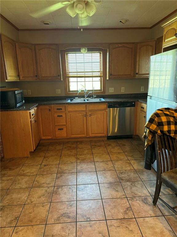 30 Summit Street Clarksville, PA 15322 - Photo 7 of 20 a kitchen with stainless steel appliances granite countertop a stove a sink and a microwave