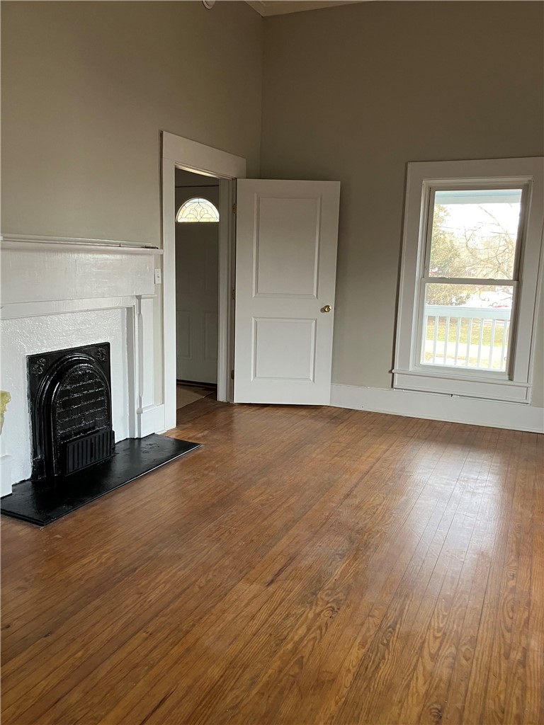 3 Wardlaw Street Pelzer, SC 29669 - Photo 5 of 6 Original hardwood floors with fireplace (non working).