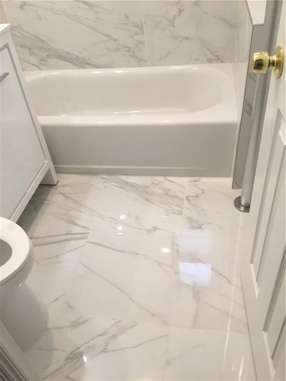 9307 3rd Avenue Brooklyn, NY 11209 - Photo 20 of 23 a view of bathtub