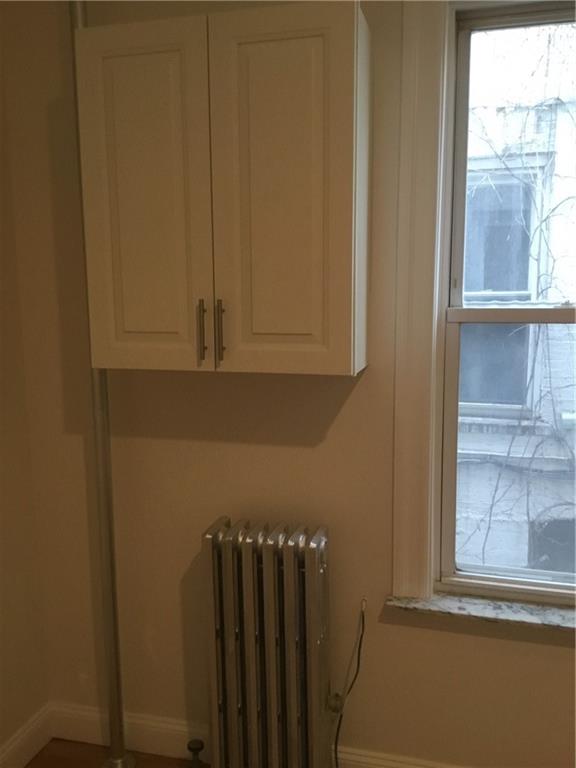 9307 3rd Avenue Brooklyn, NY 11209 - Photo 21 of 23 a view of wooden door