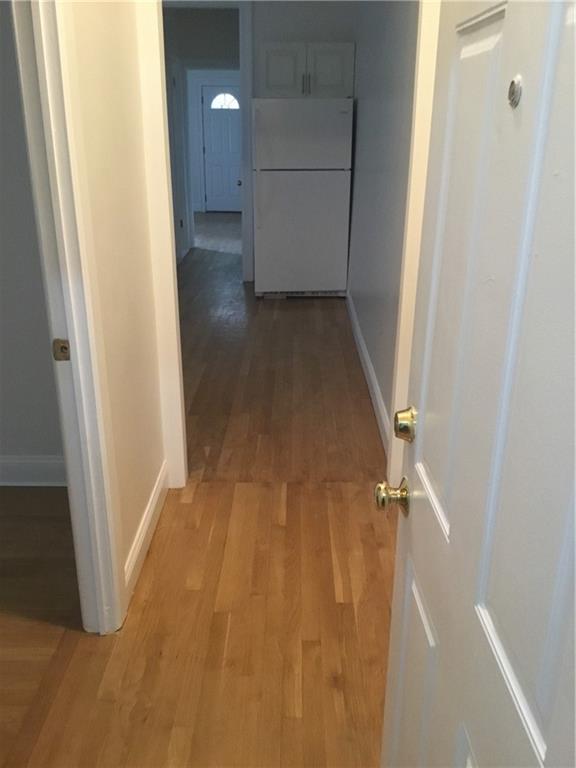 9307 3rd Avenue Brooklyn, NY 11209 - Photo 22 of 23 a view of a hallway