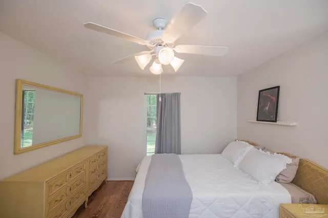 a bedroom with a bed and a closet