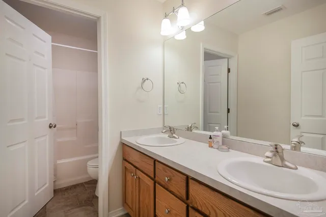 a bathroom with a sink and a bathtub