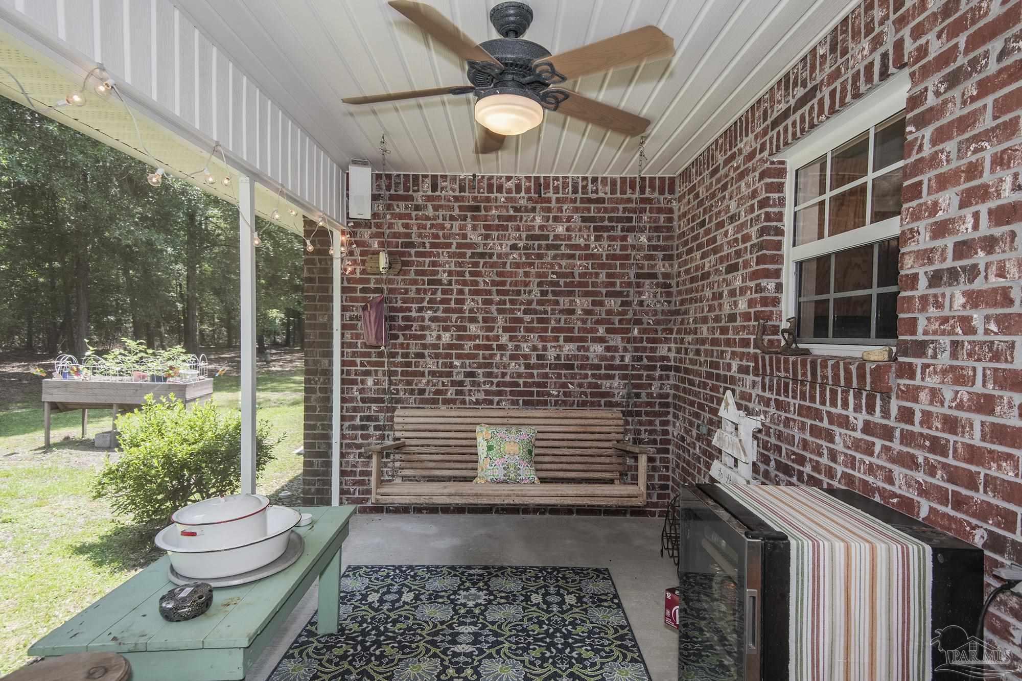 8501 Highway 97 Walnut Hill, FL 32568 - Photo 42 of 55 a bathroom with a toilet