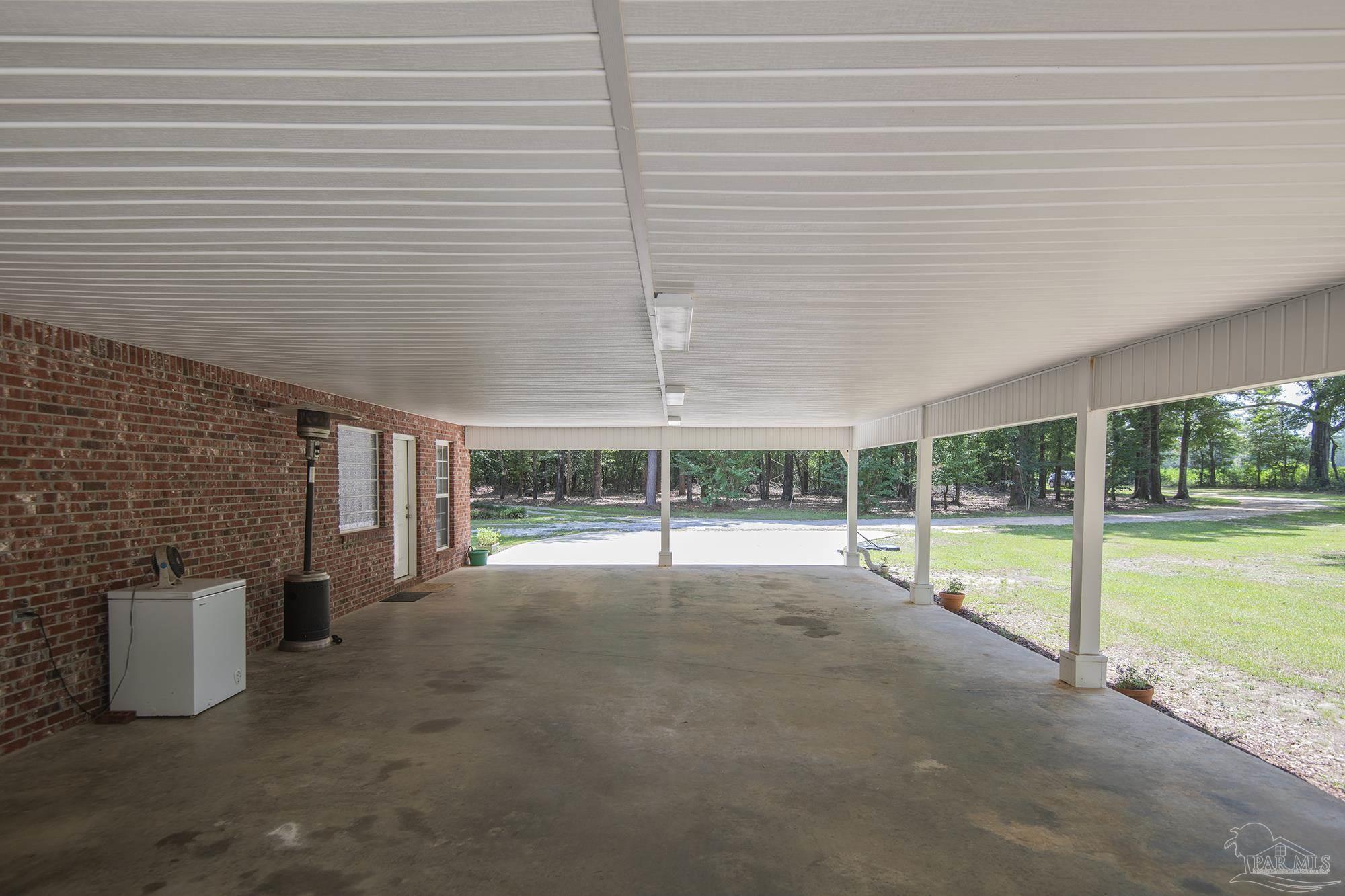 8501 Highway 97 Walnut Hill, FL 32568 - Photo 46 of 55 a view of an empty room with a window