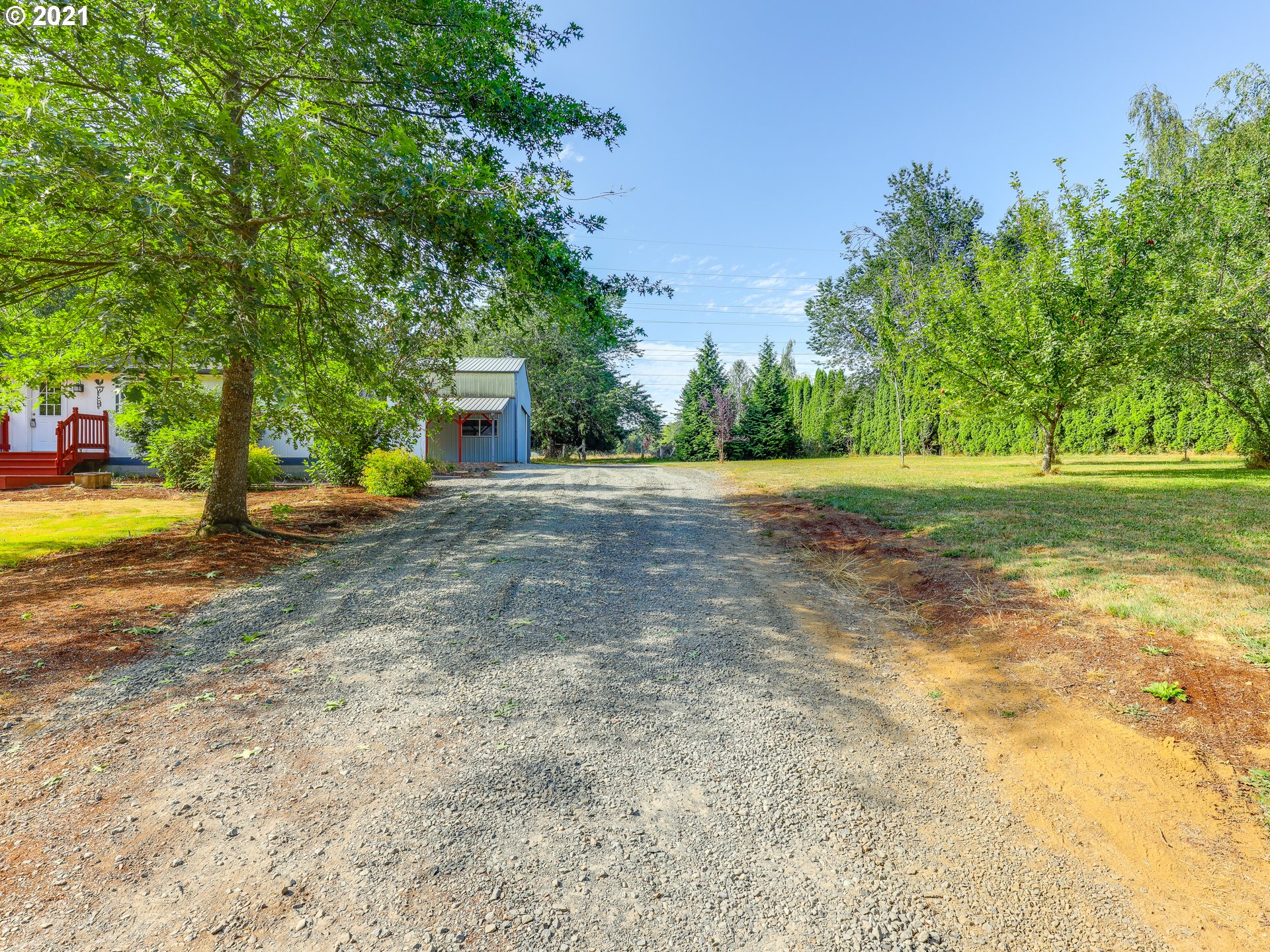 44644 Southeast Coalman Road Sandy, OR 97055 - Photo 30 of 31 a view of a backyard with large trees