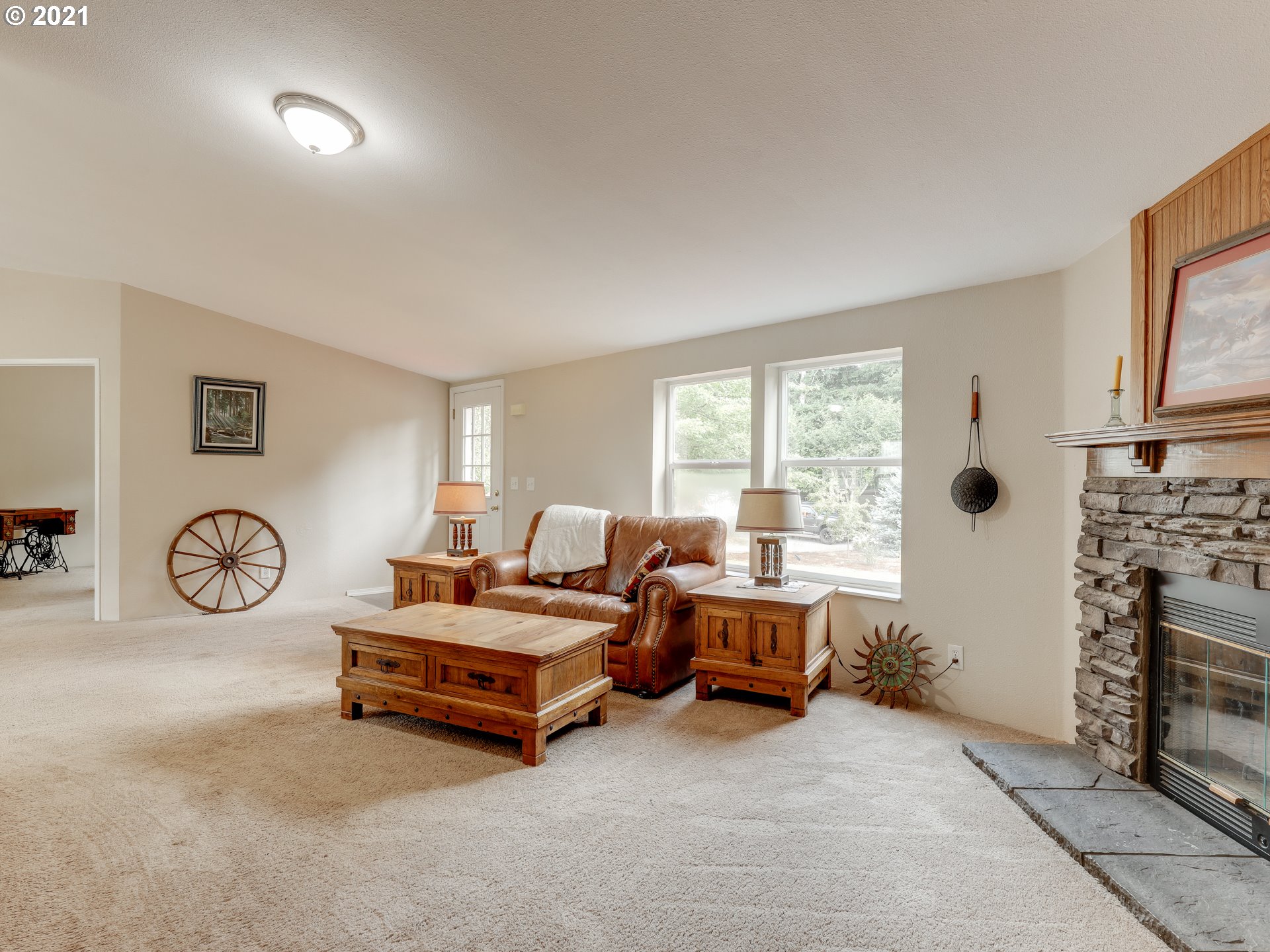 44644 Southeast Coalman Road Sandy, OR 97055 - Photo 6 of 31 a living room with furniture a rug and a window