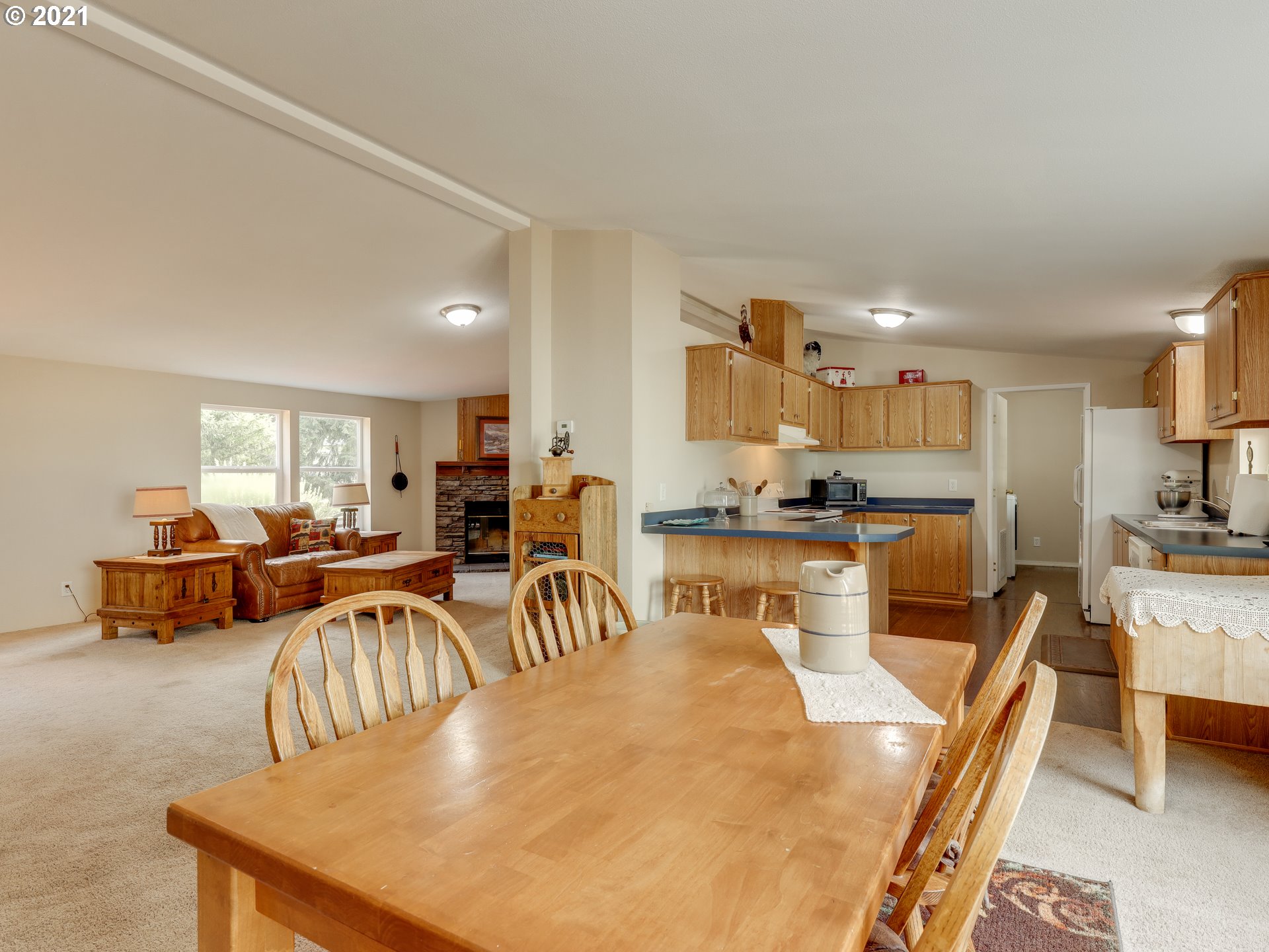 44644 Southeast Coalman Road Sandy, OR 97055 - Photo 7 of 31 a view of a dining room with furniture