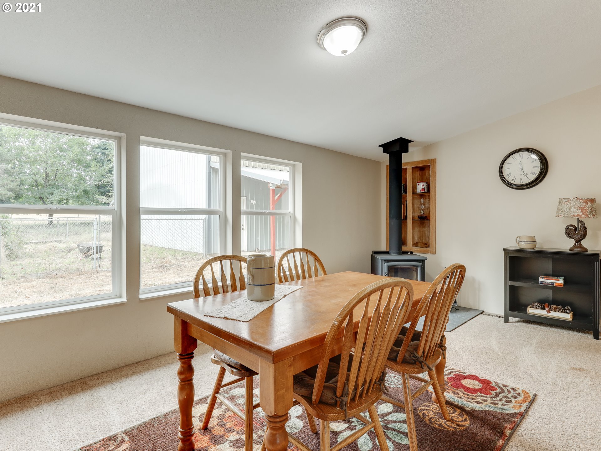 44644 Southeast Coalman Road Sandy, OR 97055 - Photo 8 of 31 a view of a dining room with furniture and window
