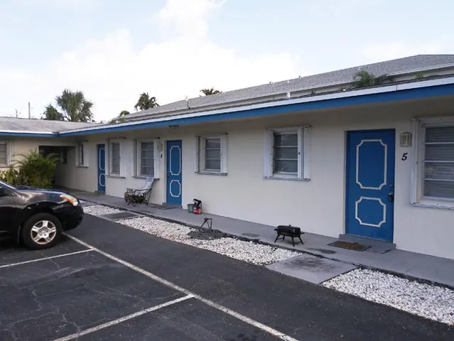 a car parked in front of a house