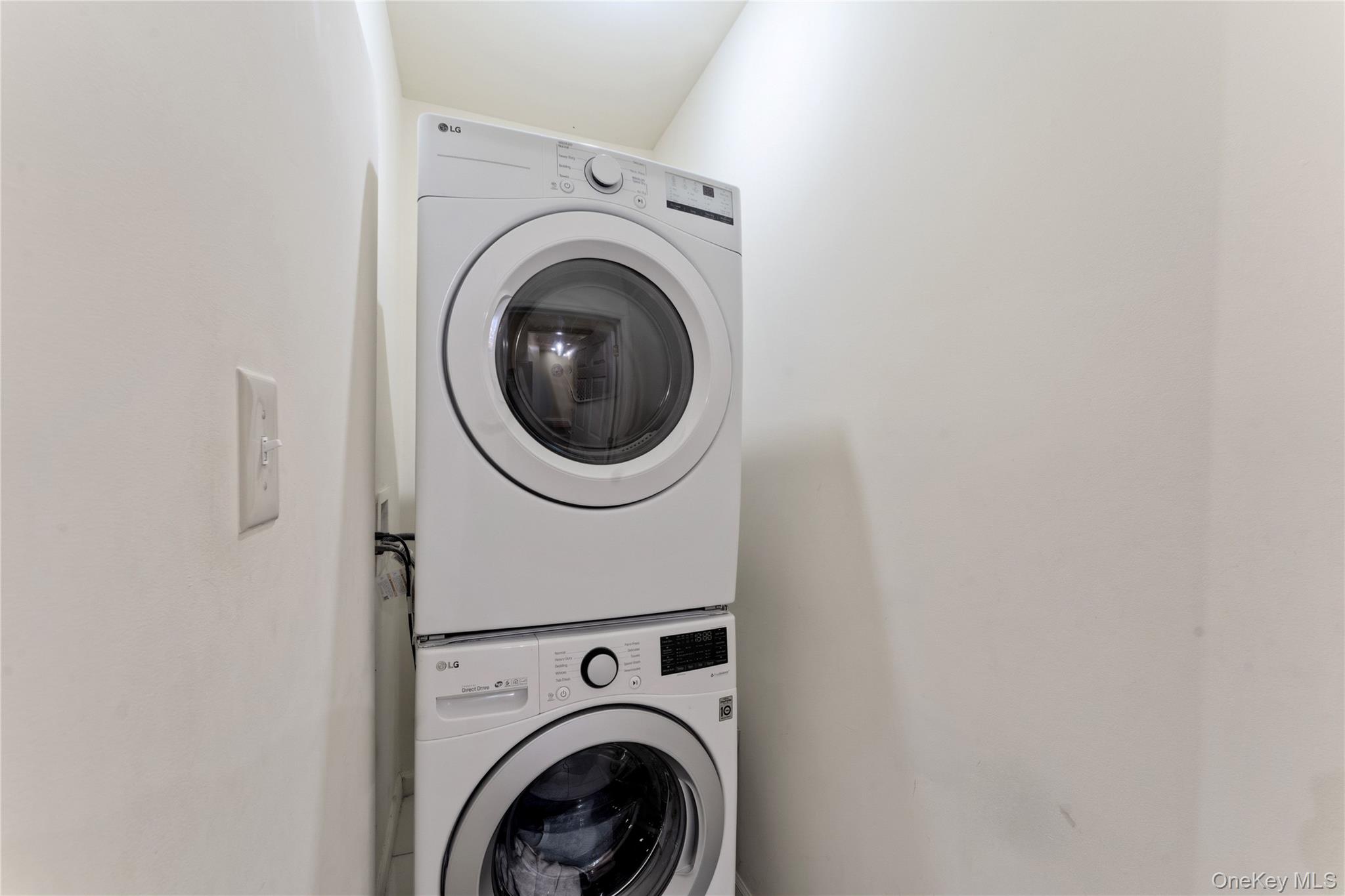 136 Meridian Boulevard Queens, NY 11692 - Photo 11 of 29 a utility room with dryer and washer
