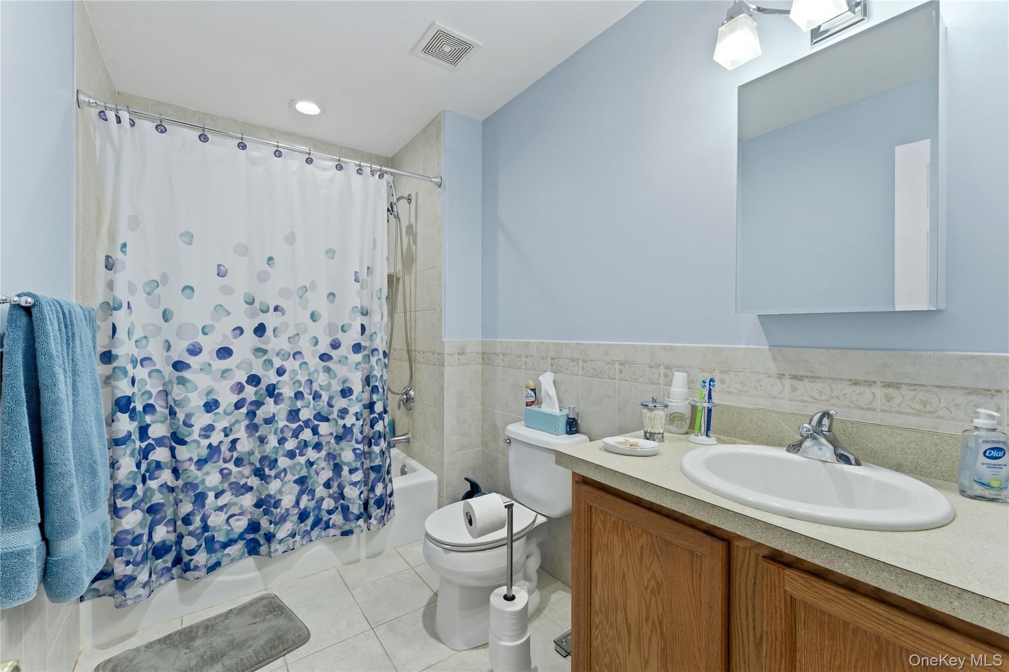 136 Meridian Boulevard Queens, NY 11692 - Photo 16 of 29 a bathroom with a sink toilet and shower