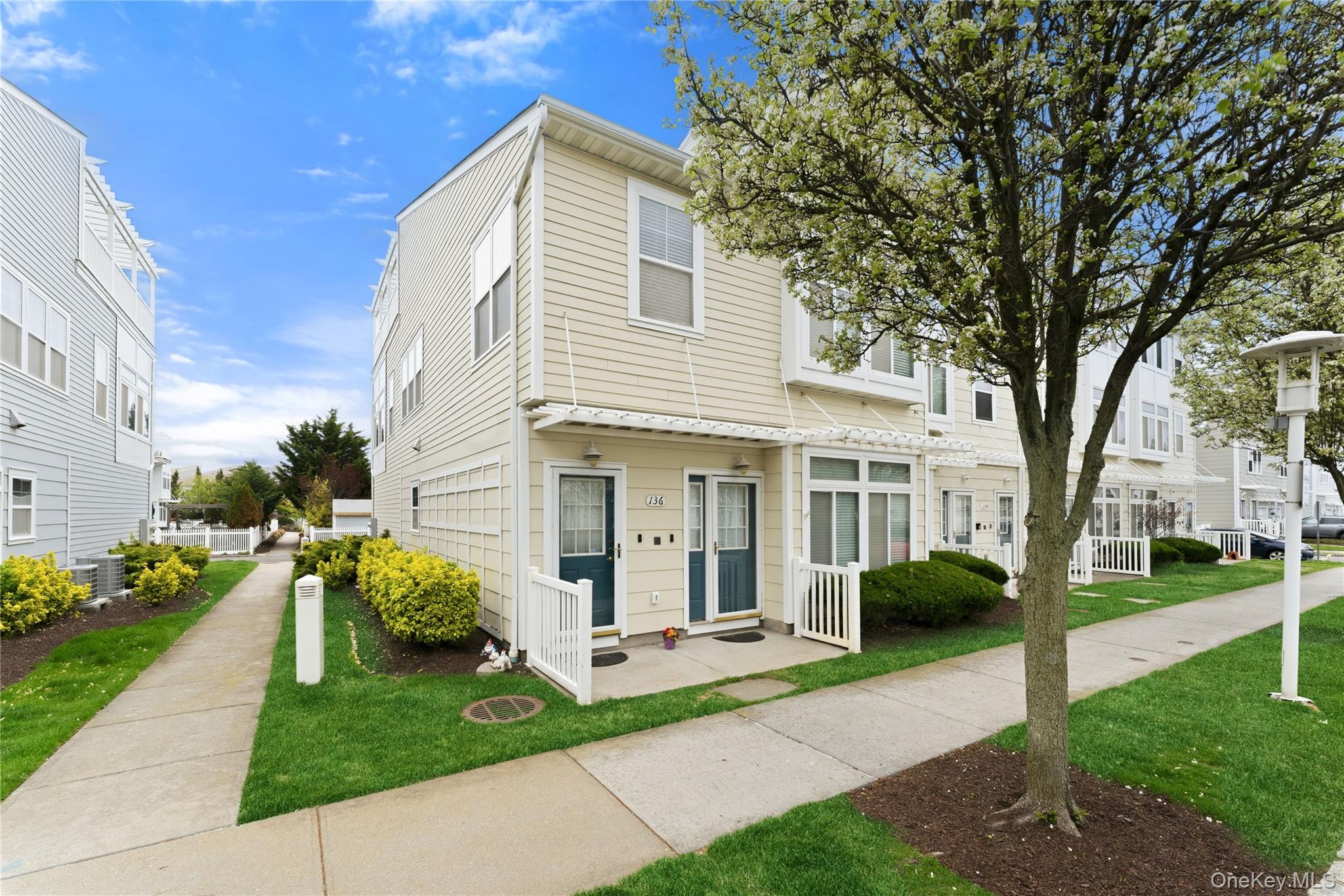 136 Meridian Boulevard Queens, NY 11692 - Photo 28 of 29 a view of a house with a backyard