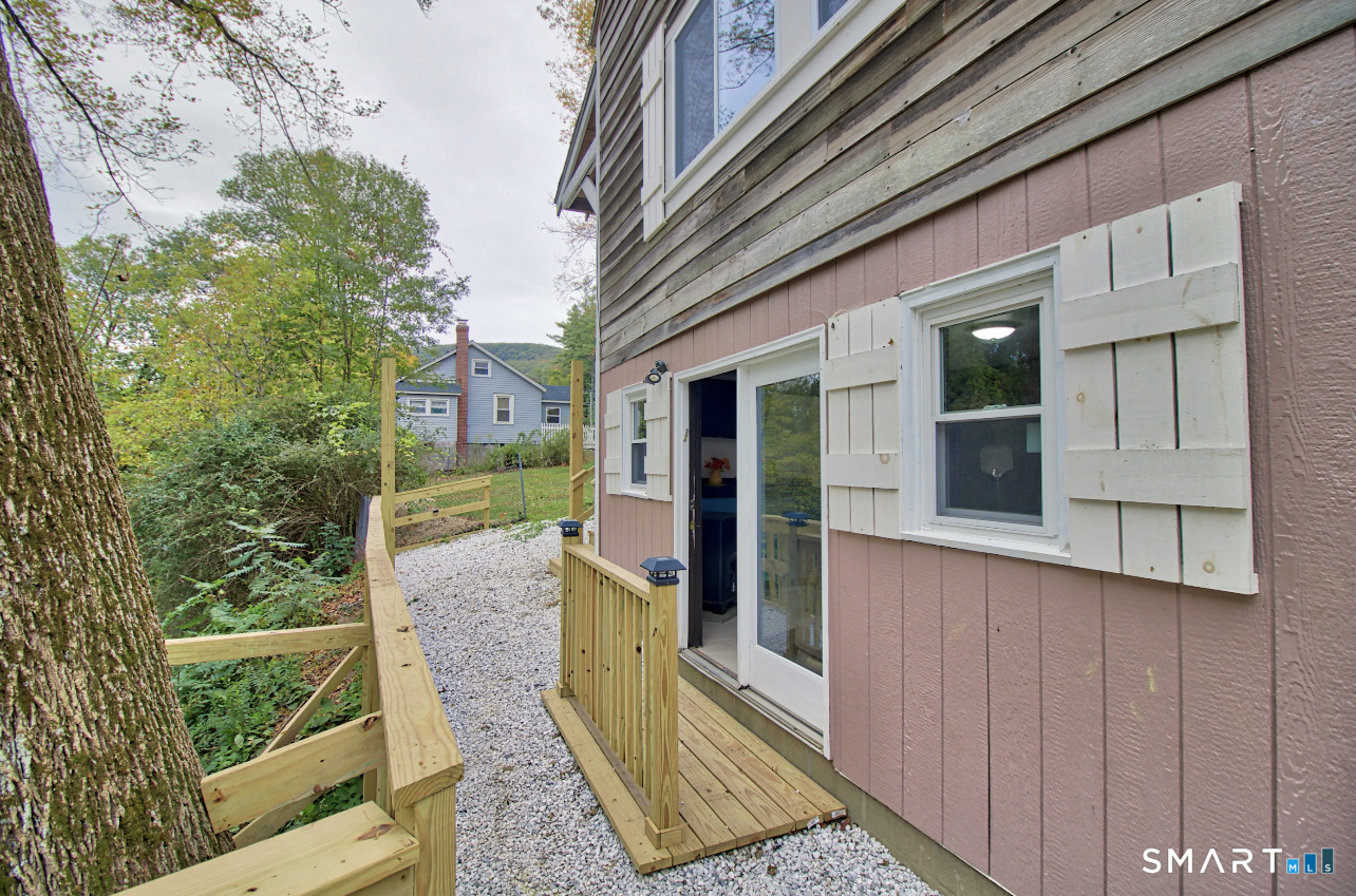 15 Lower Road North Canaan, CT 06018 - Photo 9 of 36 a view of a pathway of a house with a porch