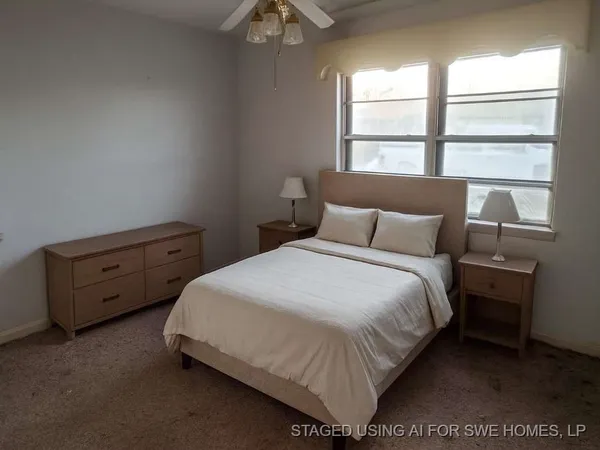 an empty room that has a grey walls