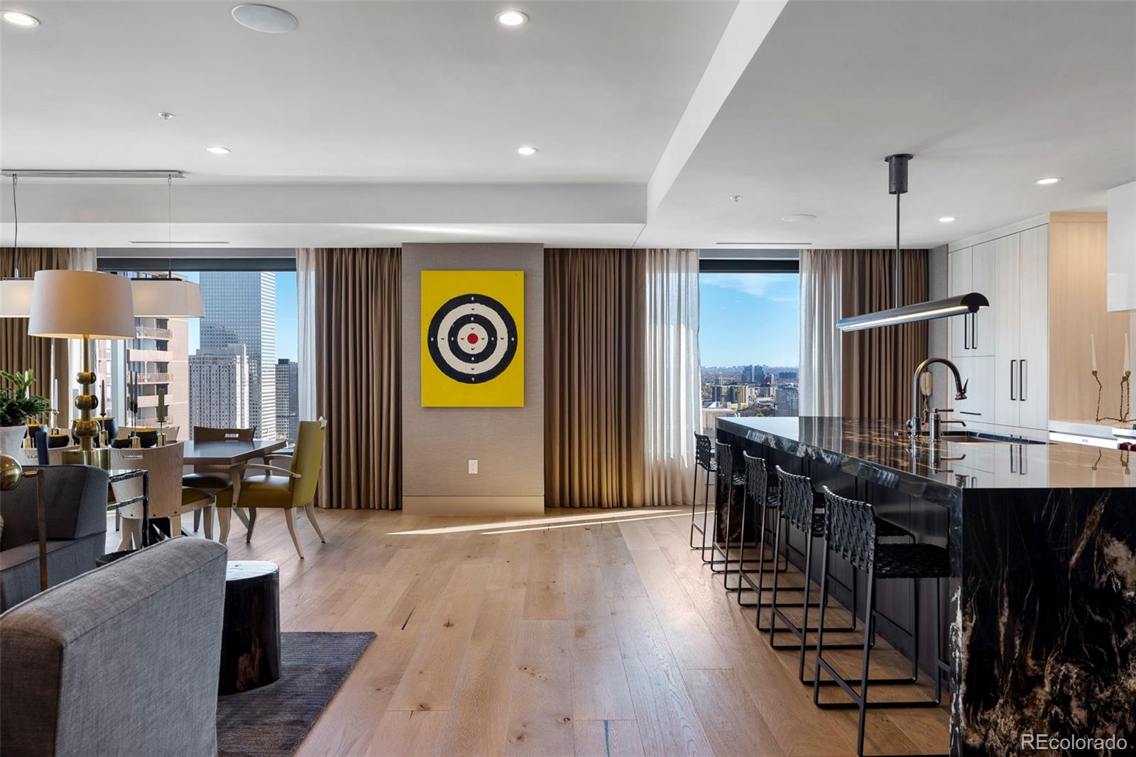 1133 14th Street, Unit 2820 Denver, CO 80202 - Photo 1 of 34 a view of a dining room with furniture and wooden floor